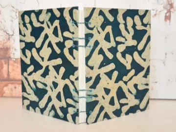 Show details for Coptic Hardcover Watercolor Journal with Fabriano Cotton Hot Press Xtra White Paper Picture of Coptic Hardcover Watercolor Journal with Fabriano Cotton Hot Press Xtra White Paper