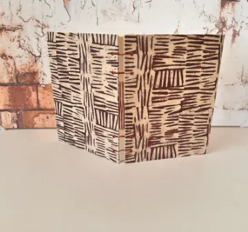 Show details for Hardcover Watercolor Journal Sketchbook with Fabriano Cotton Hot Press Paper and Lokta Cover Picture of Hardcover Watercolor Journal Sketchbook with Fabriano Cotton Hot Press Paper and Lokta Cover